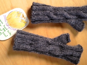 Hand knit mitts made from Coco the goat